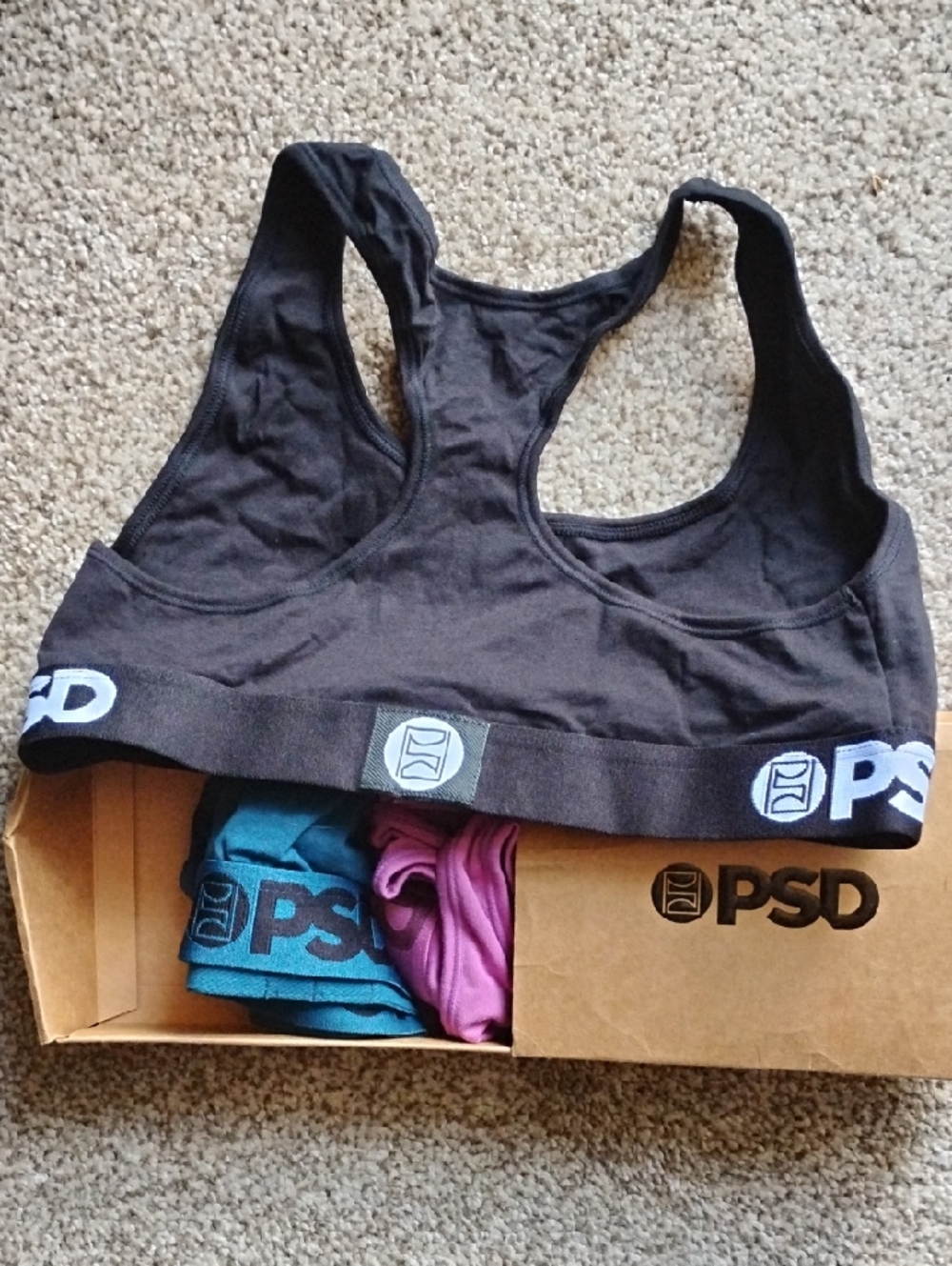 PSD 3 Racerback Sports Bras with logo on band.